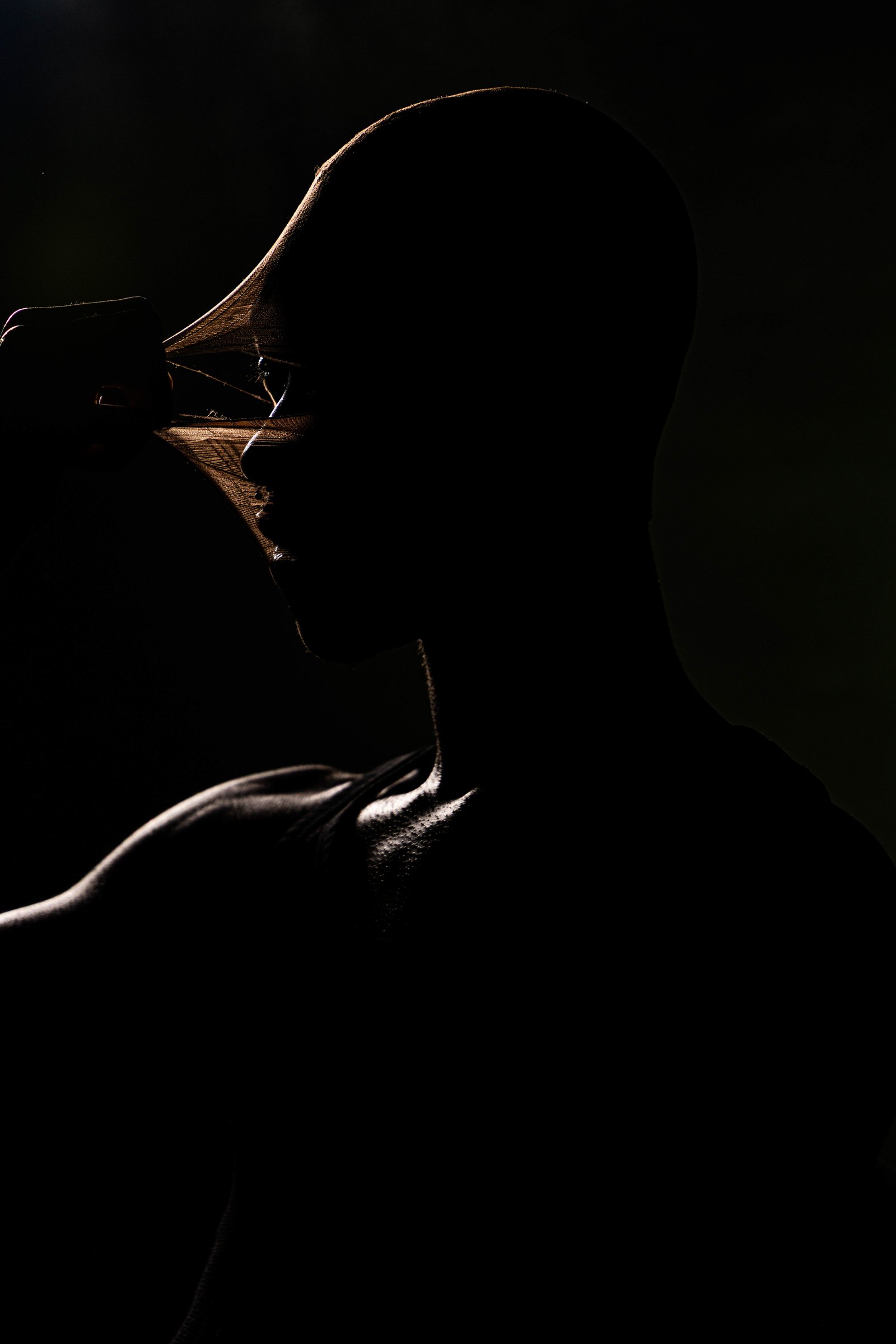 Rim-lit profile with fabric stretched outward