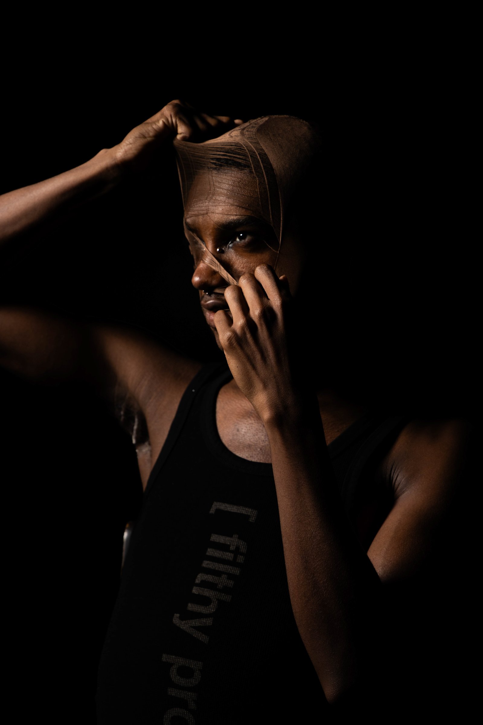 Three-quarter portrait, fabric peeled back